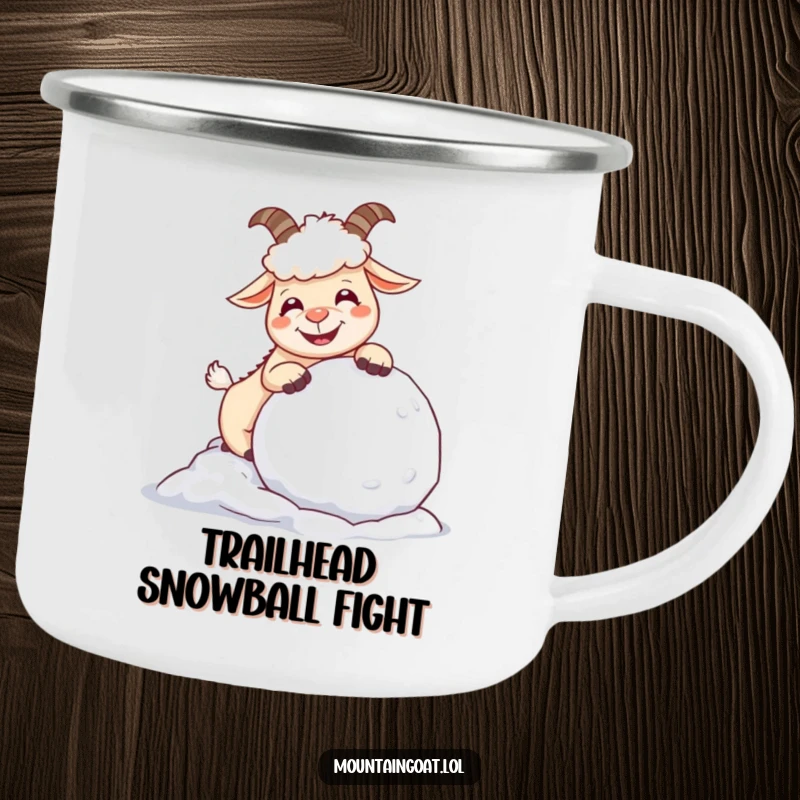 Funny giggling mountain goat nudging a snowball, ready for adventure on a durable camping mug, perfect for outdoor humor.