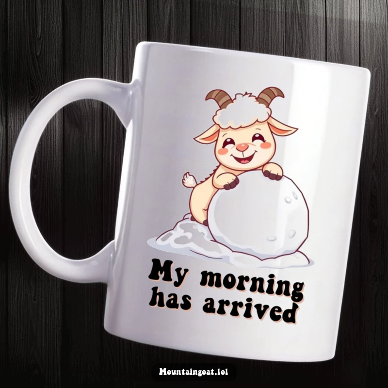 Funny giggling mountain goat playfully nudging a huge snowball, captured in a delightful, heartwarming scene on a mug.