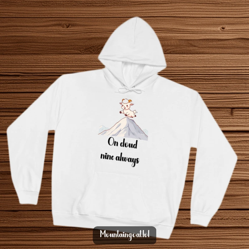 Funny kawaii mountain goat skipping ecstatically on mountaintop clouds, featured on a warm and cozy hoodie.