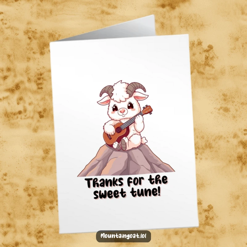 Funny free printable thank you card featuring a fluffy mountain goat on a peak, serenely playing a ukulele.