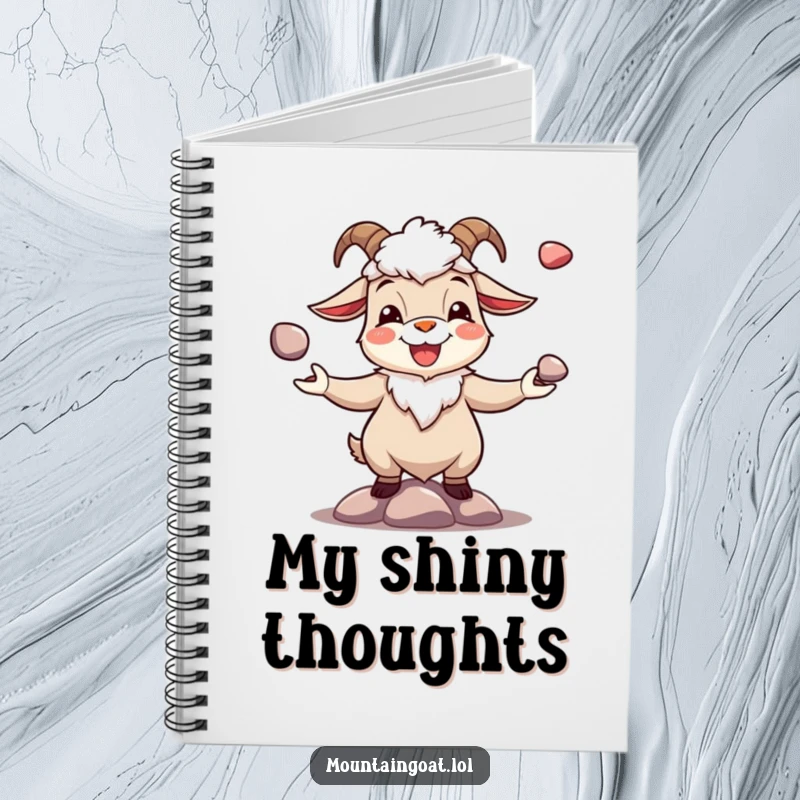 Funny joyous mountain goat juggling pebbles, on the cover of a notebook for writing and notes.