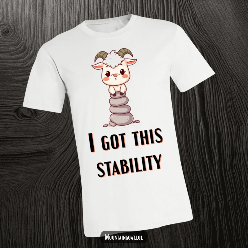 Funny Mountain Goat T-Shirt: A smiling goat artistically balances a tall stack of stones, showcasing its quirky charm.